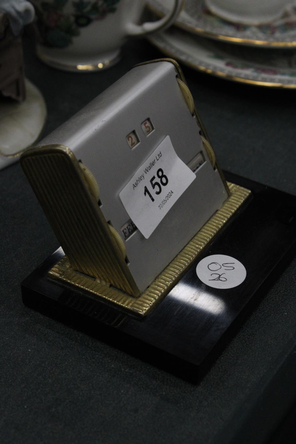 A 1950'S EXCLUSIVE DESK, ROLLER, CALENDAR IN BRASS AND BAKELITE - Image 2 of 2