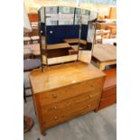 A MID 20TH CENTURY OAK THREE DRAWER DRESSING CHEST WITH TRIPLE MIRROR, 39" WIDE