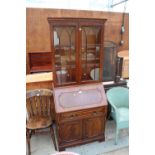 A REPRODUCTION MAHOGANY BUREAU BOOKCASE WITH FITTED INTERIOR, 29.5" WIDE