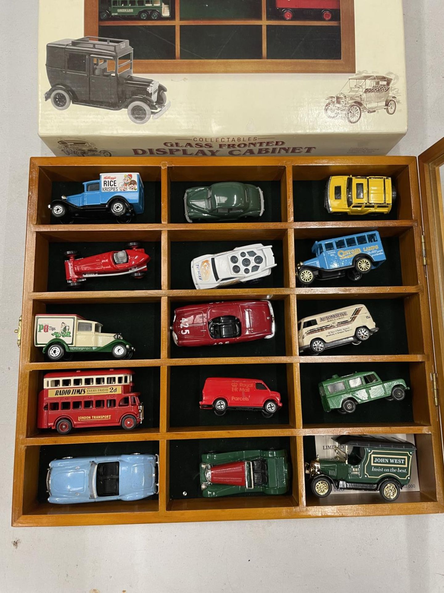 A WOODEN GLASS FRONTED DISPLAY CABINET INCLUDING FIFTEEN MODEL VEHICLES - Image 2 of 4
