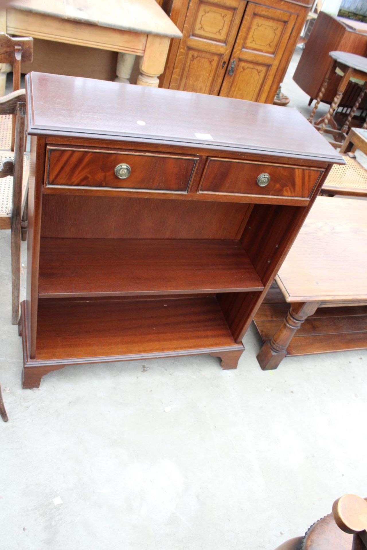 A REPRODUCTION MAHOGANY J.SYDNEY SMITH TWO TIER OPEN BOOKCASE WITH TWO FRIEZE DRAWERS