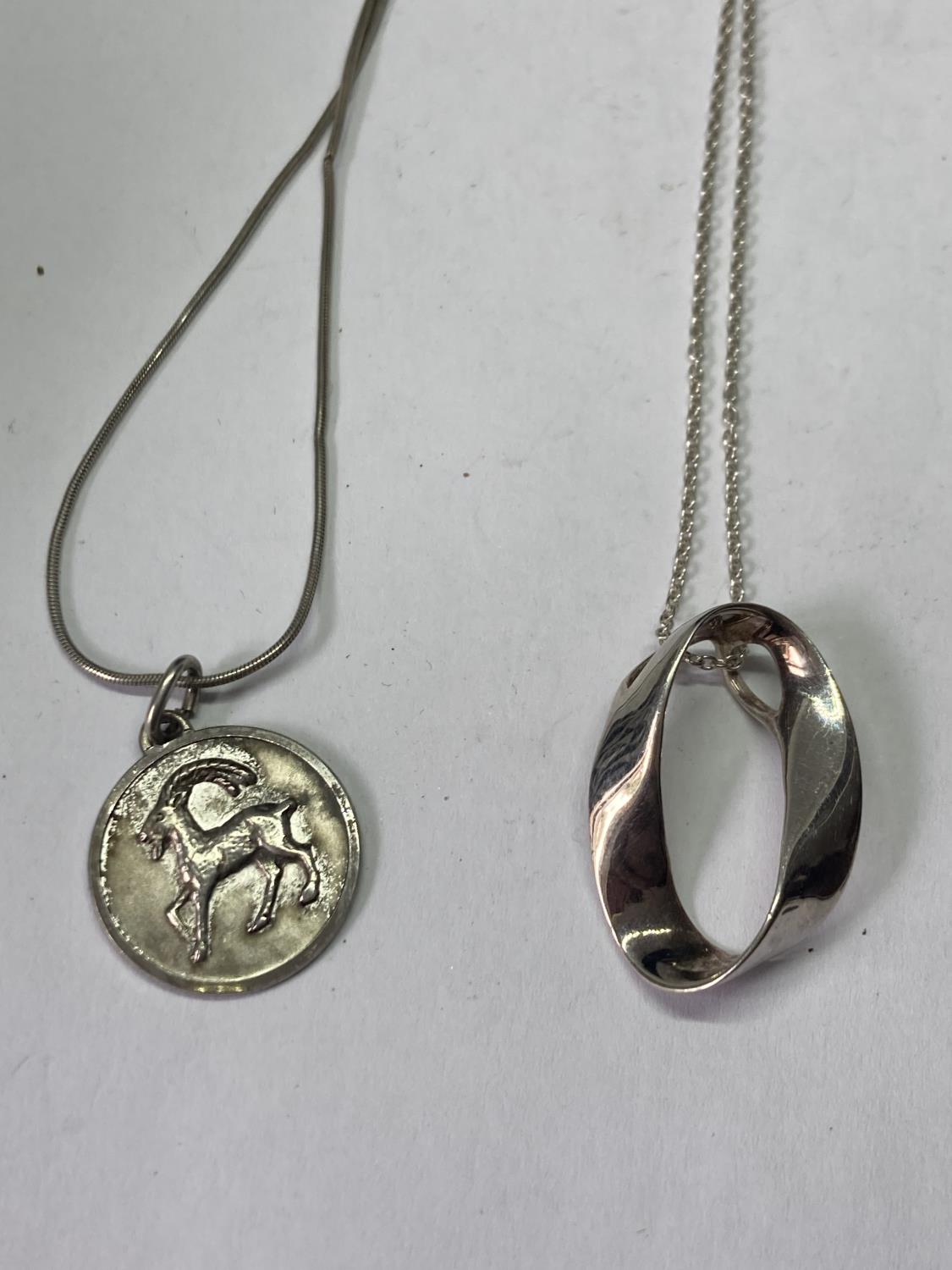 FOUR SILVER NECKLACES WITH PENDANTS - Image 2 of 3