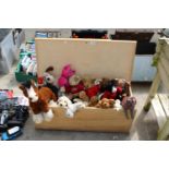 A WOODEN TOY BOX WITH AN ASSORTMENT OF PLUSH TOYS