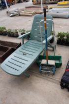 A PLASTIC SUN LOUNGER, A SEEDER AND AN AIRATOR