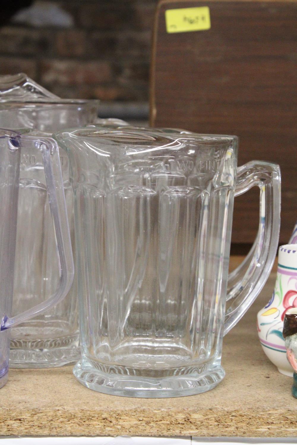 FIVE CHUNKY GLASS TWO PINT BEER JUGS, ONE FOUR PINT PLUS ONE PIMMS - Image 3 of 3