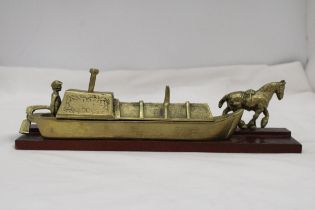 A BRASS BARGE, BARGEE AND TOW HORSE ON A WOODEN BASE, LENGTH 30CM