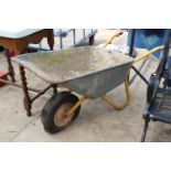 A LARGE METAL WHEEL BARROW WITH RUBBER TYRE