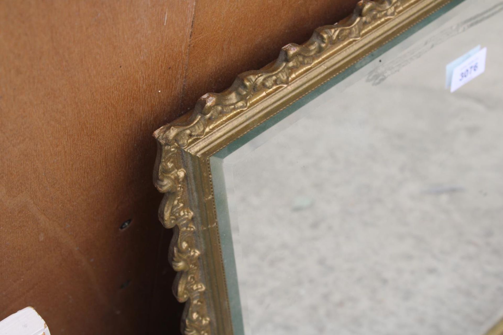 A GILT FRAMED WALL MIRROR, 23" X 21" - Image 2 of 2