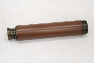 A VINTAGE LEATHER BOUND TWO DRAW TELESCOPE