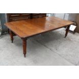 A LATE VICTORIAN OAK FORMER WIND-OUT DINING TABLE, 93" X 47" WITH LEAVES FIXED IN