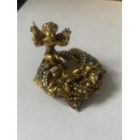 A GILT PLATED CHERUB DESK ORNAMENT