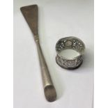 A HALLMARKED BIRMINGHAM SILVER HANDLED SHOE HORN AND AN ORIENTAL SILVER NAPKIN RING