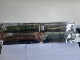 FOUR BOXED AMER CON HOBBY TRAIN ENGINES TO INCLUDE THREE STEAM AND ONE DIESEL