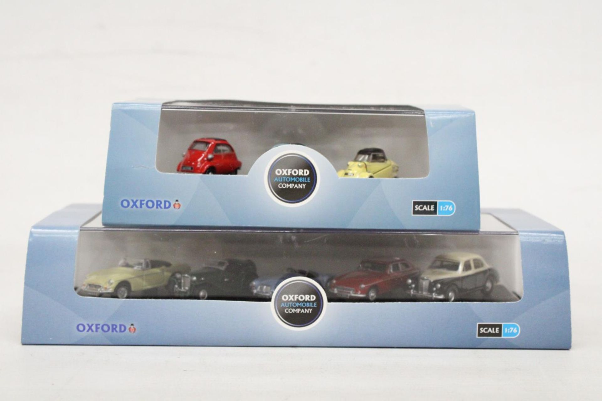 TWO OXFORD AS NEW AND BOXED AUTOMOBILE COMPANY SETS TO INCLUDE A FIVE PIECE MG SET AND A THREE PIECE