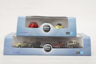 TWO OXFORD AS NEW AND BOXED AUTOMOBILE COMPANY SETS TO INCLUDE A FIVE PIECE MG SET AND A THREE PIECE