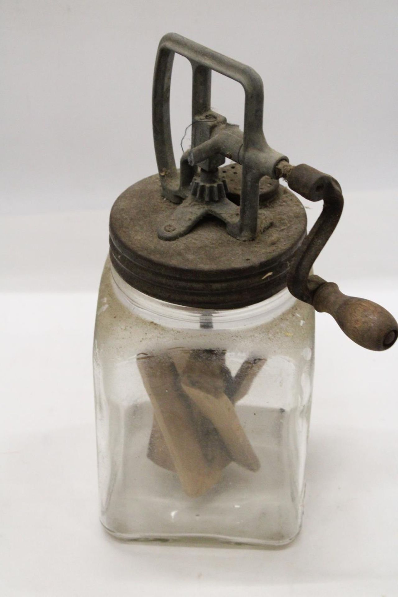 A VINTAGE GLASS BUTTER CHURN, PLUS A BASKET TRUG