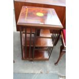 A MAHOGANY AND INLAID EDWARDIAN STYLE REVOLVING BOOKCASE, 19" SQUARE