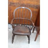 A VICTORIAN ELM WINDSOR CHAIR STAMPED E.T.WILLIAMS