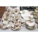 A ROYAL ALBERT CROWN CHINA "POPPY" PART TEASET TO INCLUDE CUPS, SAUCERS, SIDE PLATES AND SUGAR