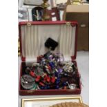 A BOX CONTAINING VINTAGE COSTUME JEWELLERY TO INCLUDE BROOCHES, RINGS, NECKLACES, ETC.,