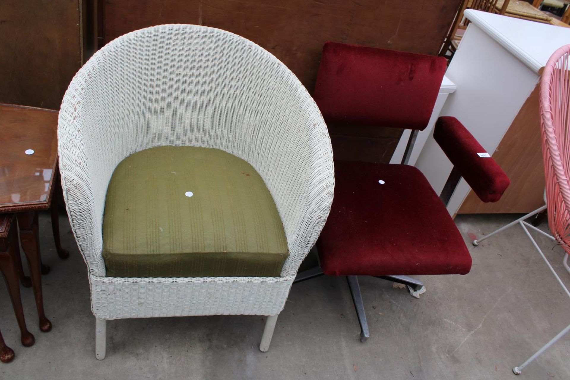 A RETRO SWIVEL OFFICE CHAIR AND A LLOYD LOOM CHAIR