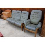 AN ERCOL THREE SEATER SETTEE AND FIRESIDE CHAIR