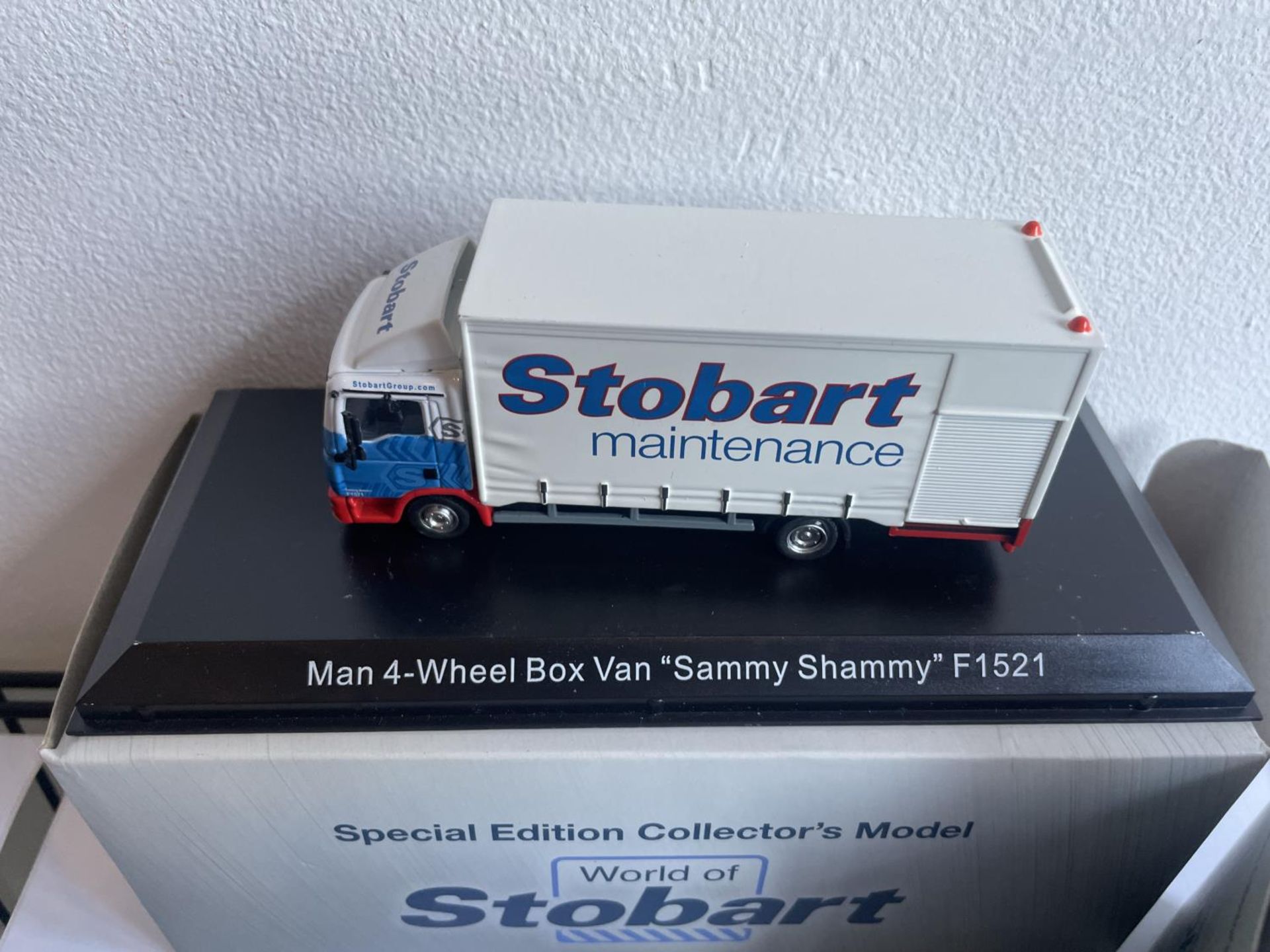 FOUR BOXED STOBART VEHICLES TO INCLUDE A UNIMOG, FIRE ENGINE AND TWO WAGONS THREE WITH COA - Image 3 of 7