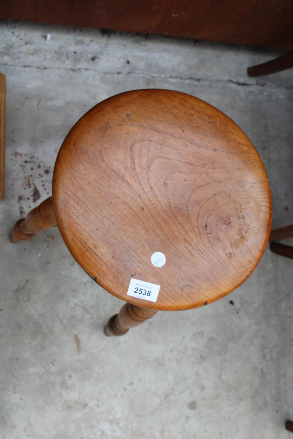 A VICTORIAN ELM STOOL ON TURNED LEGS - Image 2 of 2