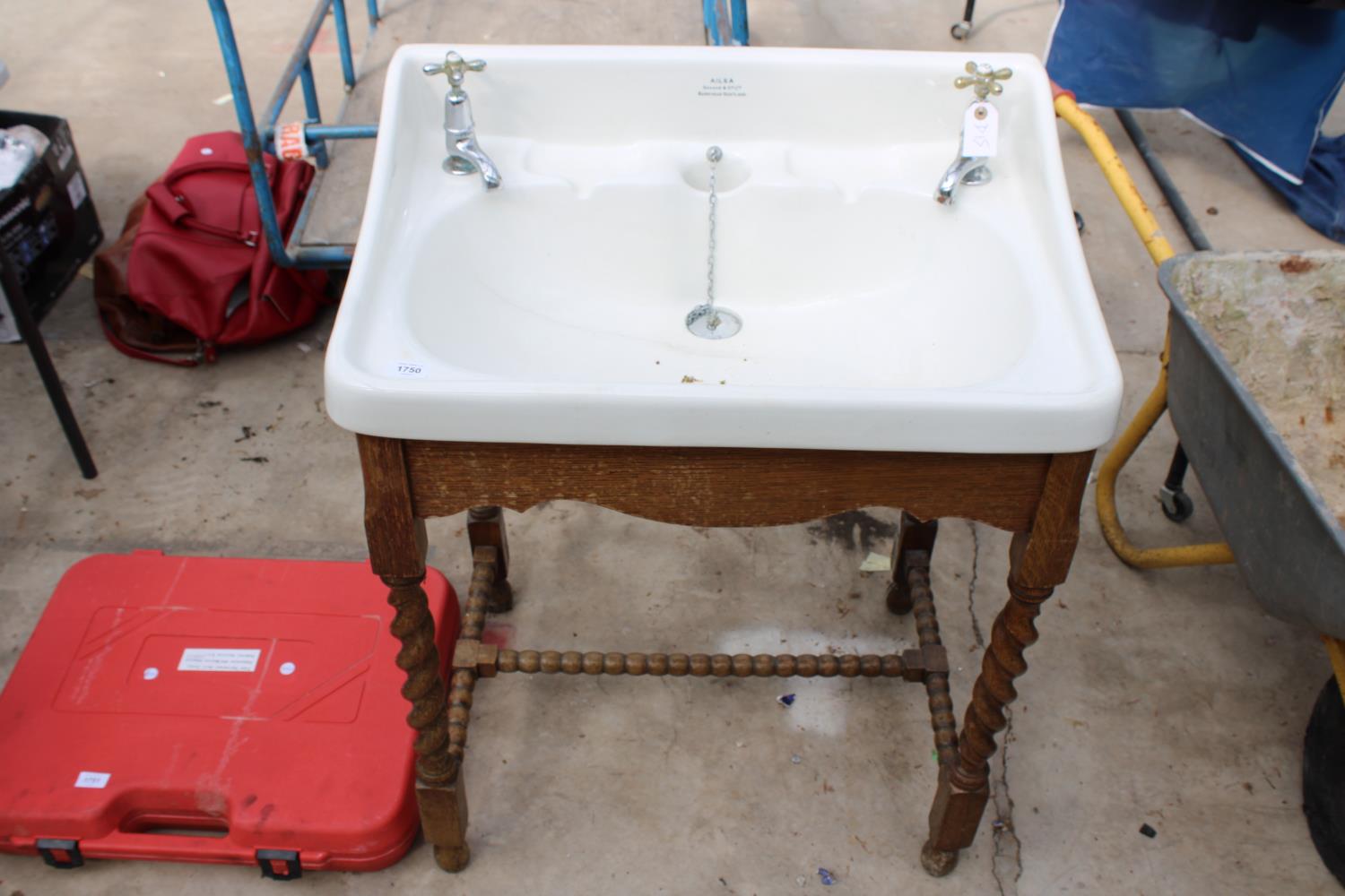 A WHITE AILSA SHANKS & CO LTD SINK WITH BARLEY TWIST WOODEN STAND