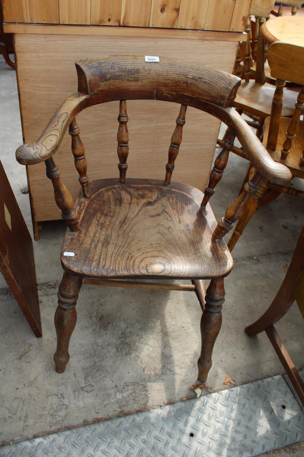 A VICTORIAN ELM AND BEECH CAPTAINS CHAIR