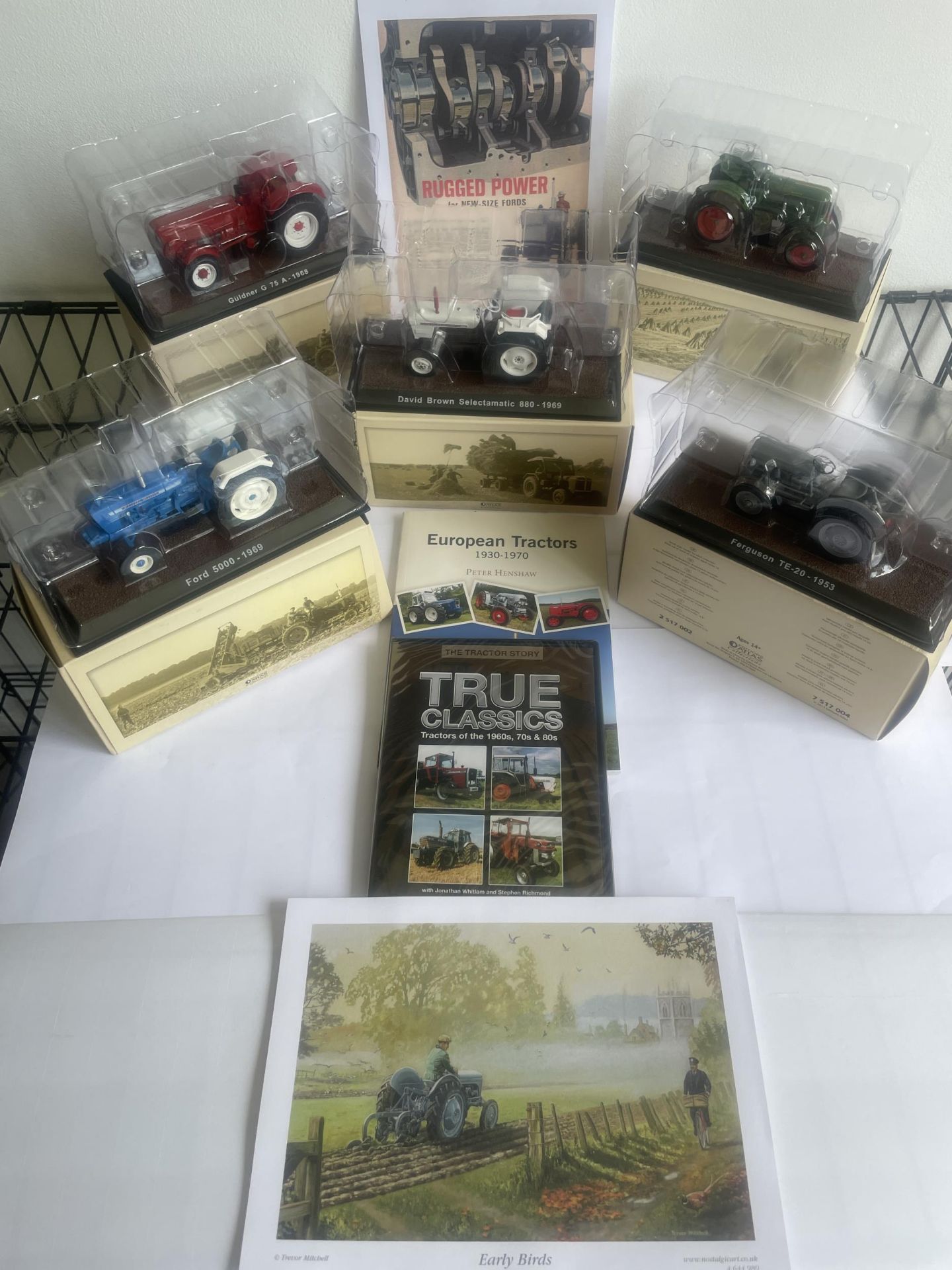 FIVE AS NEW AND BOXED ATLAS MODEL TRACTORS WITH BOOK, DVD AND TWO POSTERS ALL WITH COA