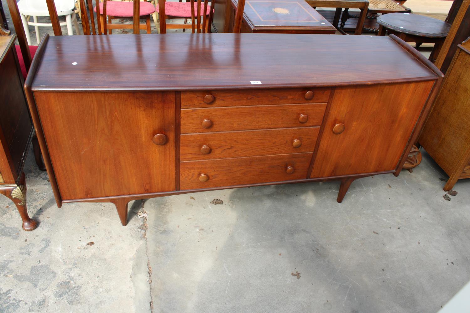 AN A YOUNGER LTD RETRO TEAK SIDEBOARD ENCLOSING TWO CUPBOARDS, FOUR DRAWERS, 66" WIDE