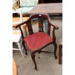 AN EDWARDIAN MAHOGANY AND INLAID CORNER CHAIR