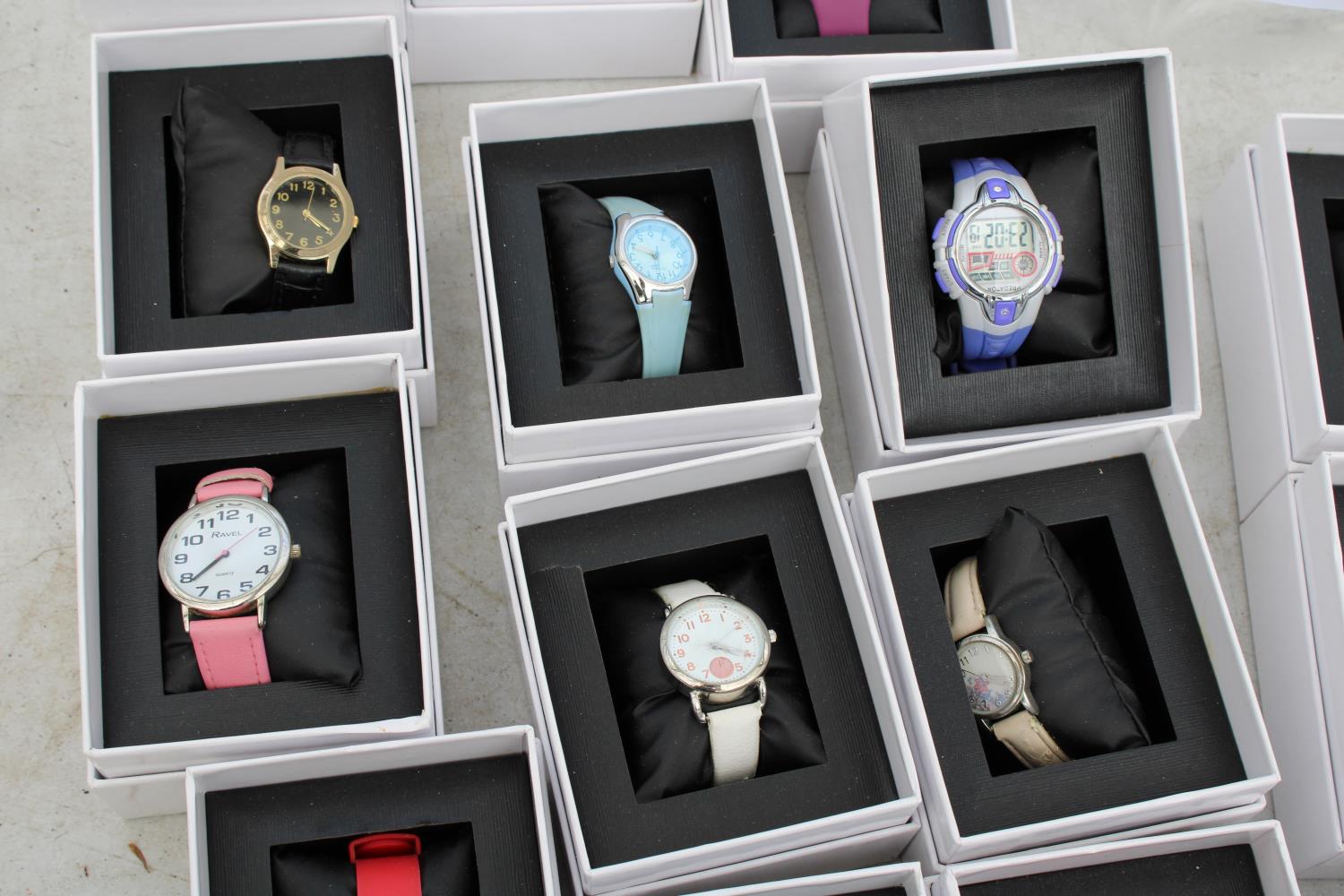 AN ASSORTMENT OF BOXED FASHION WATCHES - Image 2 of 3