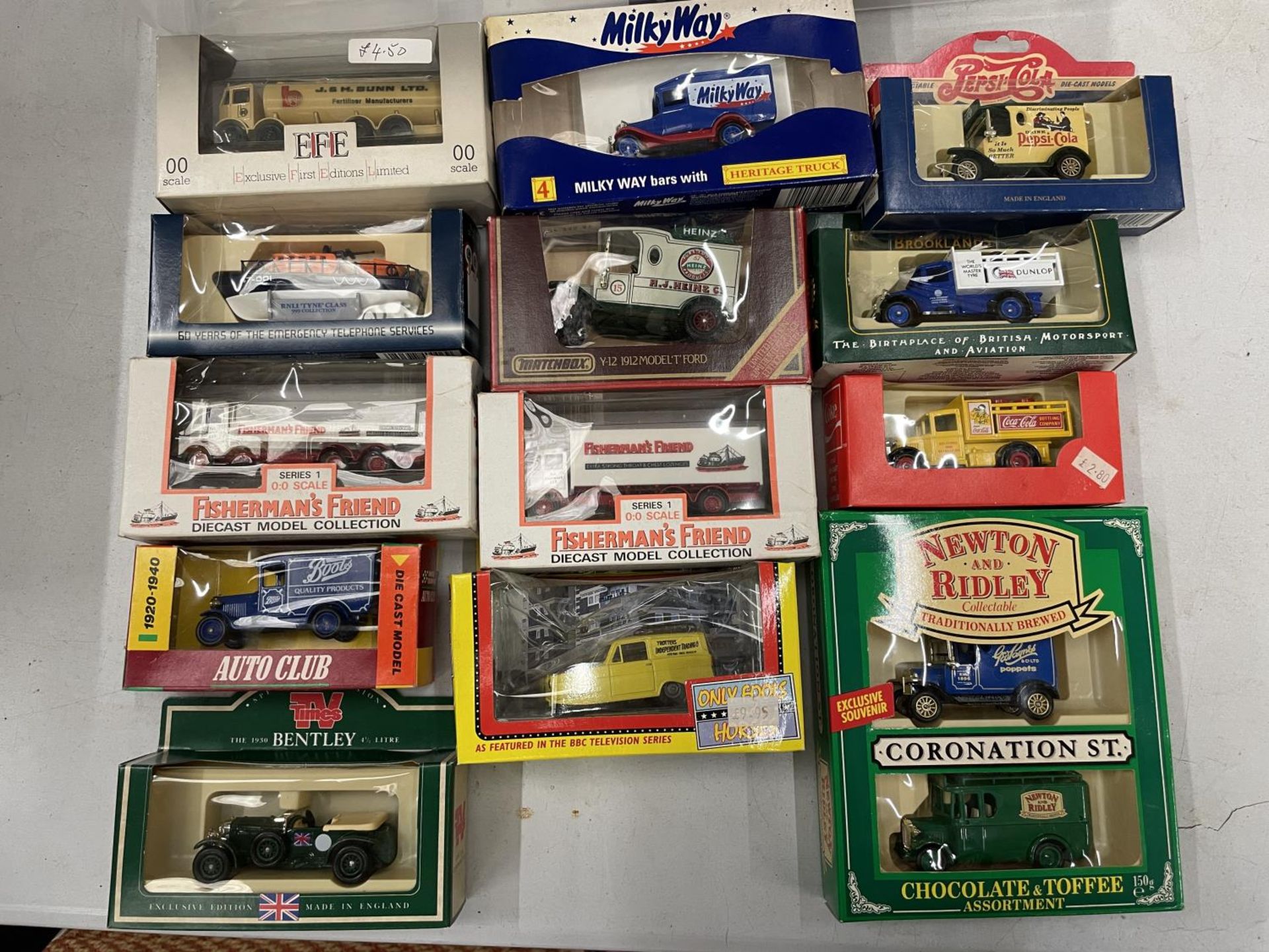 FOURTEEN BOXED ADVERTISING VEHICLES