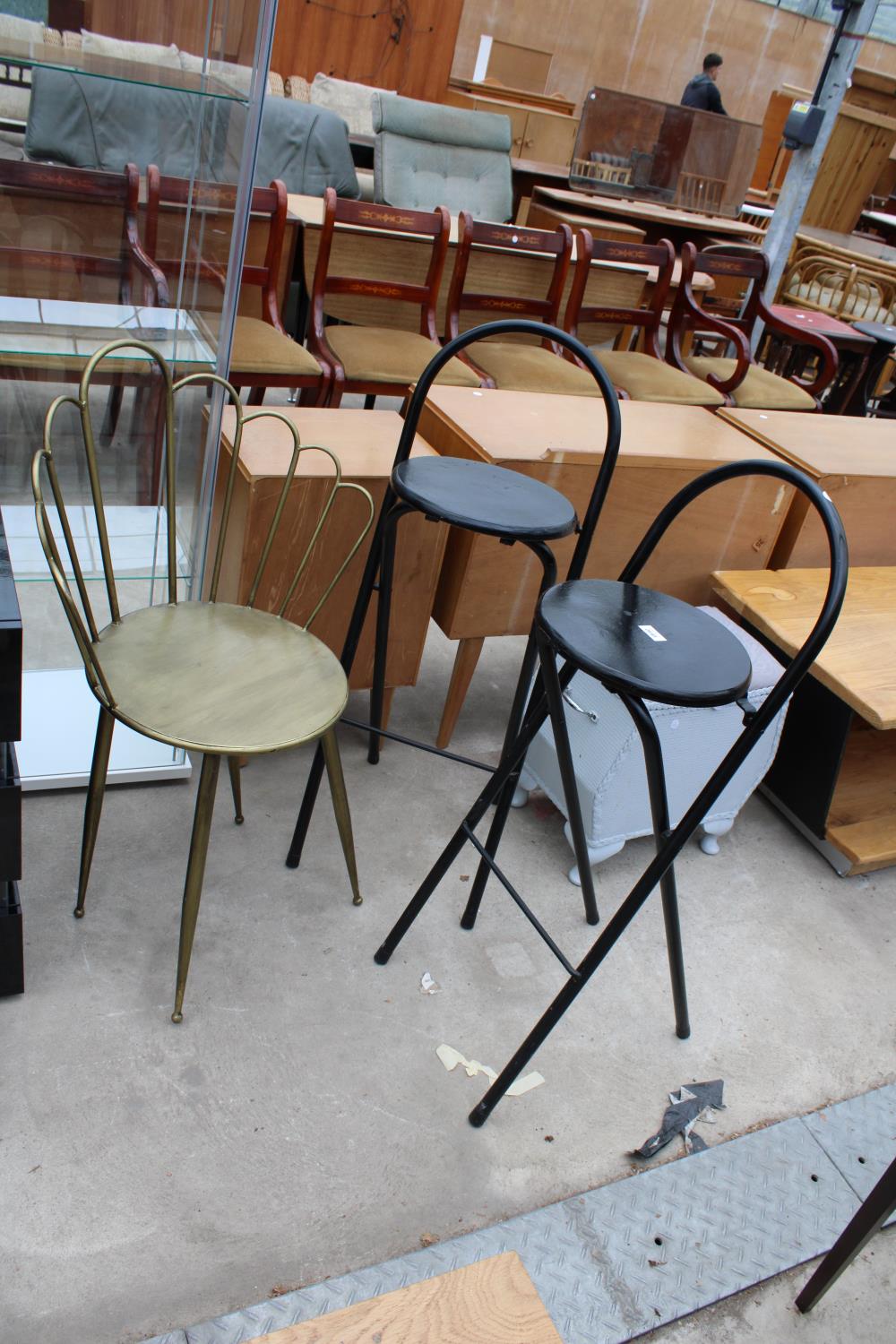 A PAIR OF HABITAT MACADAM FOLDING METAL STOOLS AND A METAL FRAMED FAN BACK CHAIR