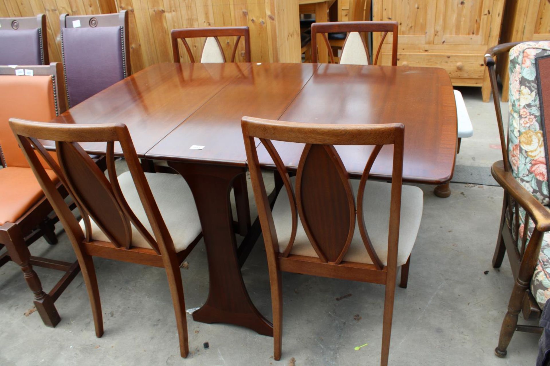 A MAHOGANY AND CROSSBANDED DROP-LEAF DINING TABLE AND FOUR CHAIRS - Image 7 of 7