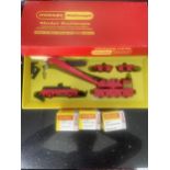 FOUR BOXED HORNBY ITEMS TO INCLUDE A BREAKDOWN CRANE SET, TWELVE BUFFER STOPS AND TEN UNCOUPLING