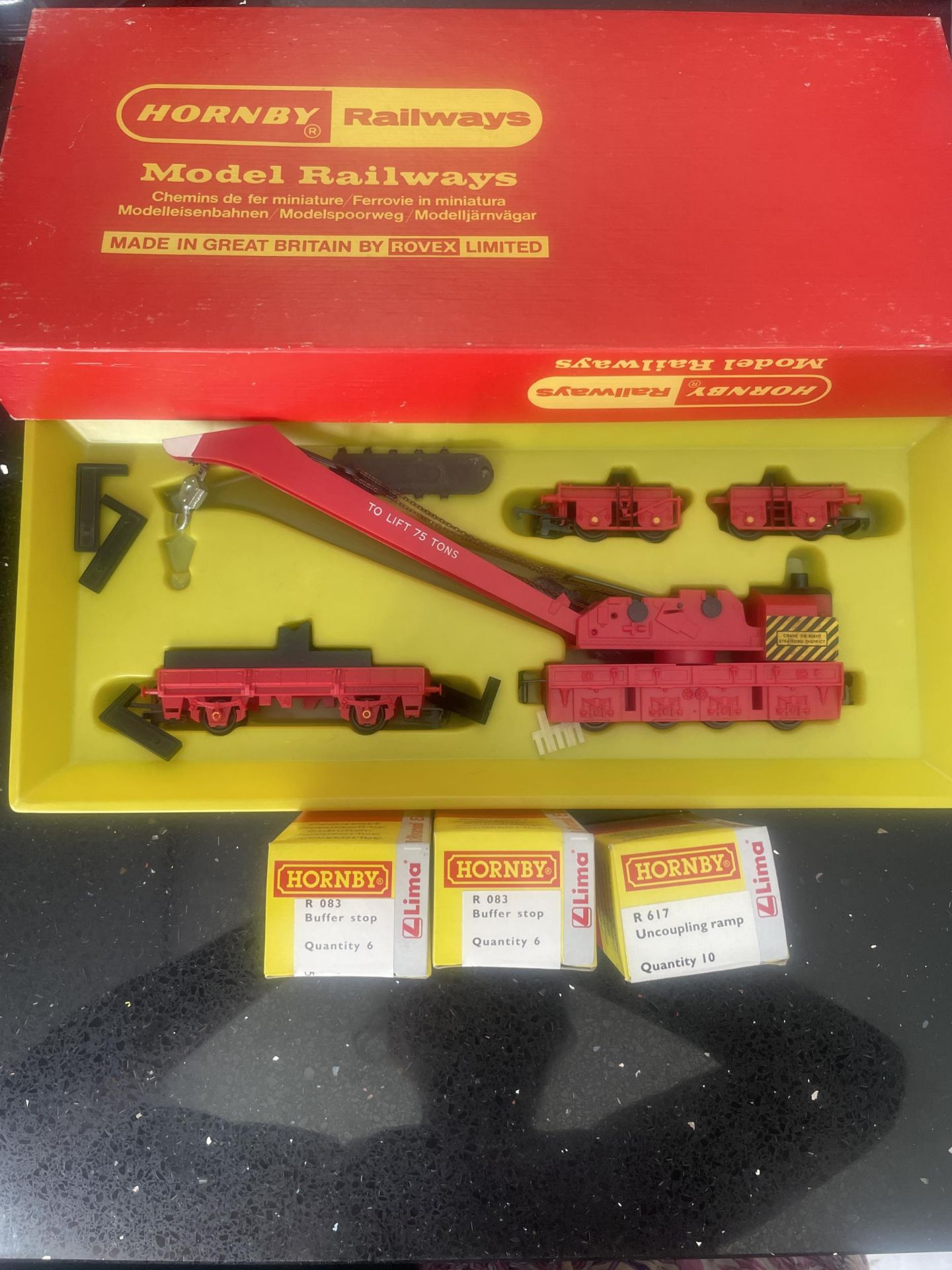 FOUR BOXED HORNBY ITEMS TO INCLUDE A BREAKDOWN CRANE SET, TWELVE BUFFER STOPS AND TEN UNCOUPLING