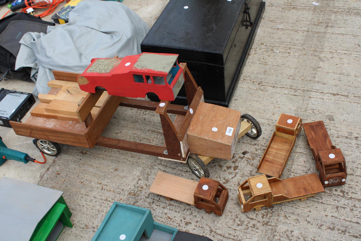 AN ASSORTMENT OF SCRATCH BUILT WOODEN MODEL TRUCKS