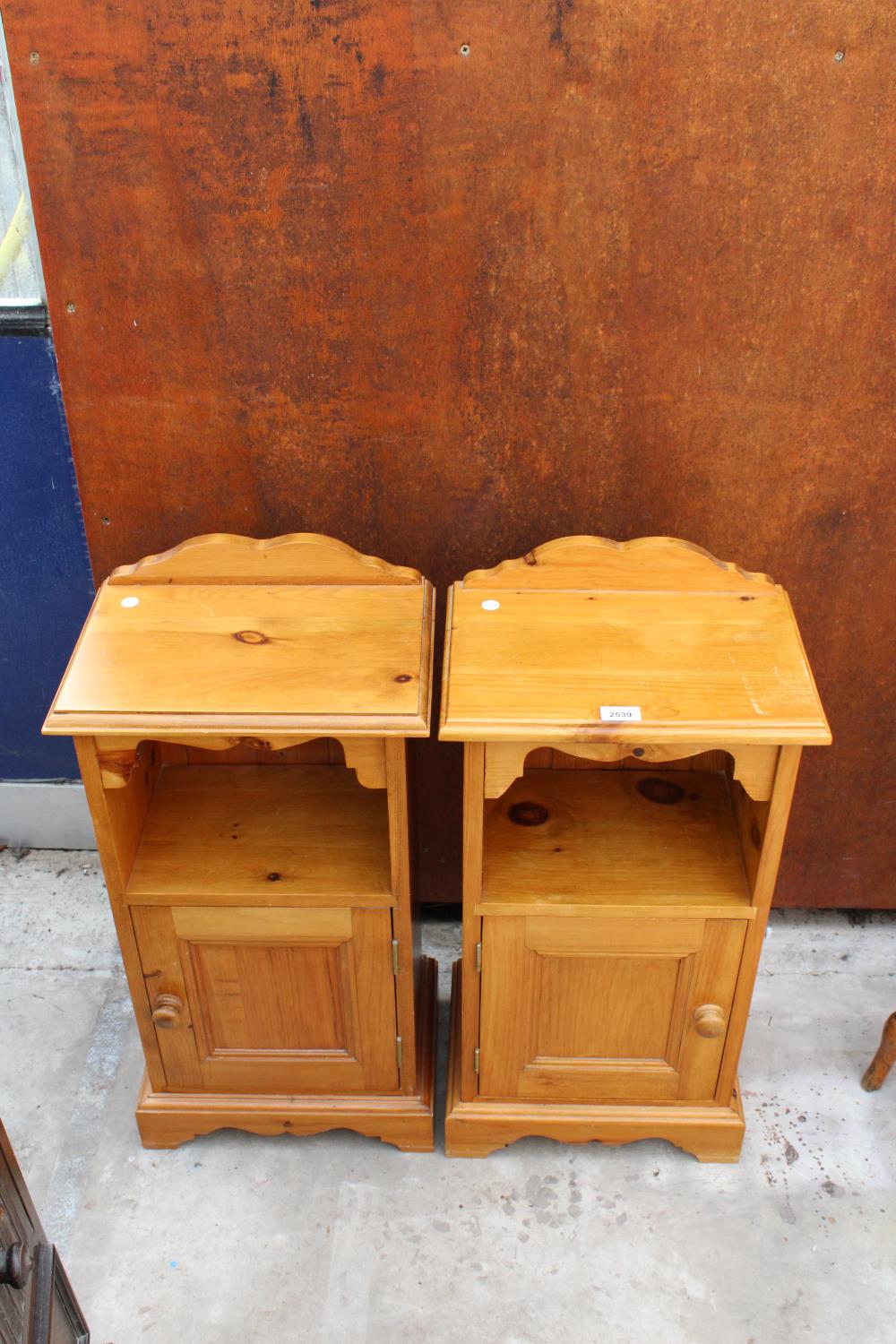 A PAIR OF PINE BEDSIDE CHESTS