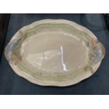 A CLARICE CLIFF PLATTER WITH FISH DESIGN, 38CM X 26CM