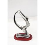 AN ART DECO, NUDE LADY, ALUMINIUM GYMNAST ON A WOODEN BASE, HEIGHT 30CM