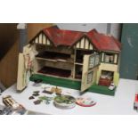 A VINTAGE DOLL'S HOUSE TO INCLUDE SOME ACCESSORIES PLUS A GARDEN ACCESSORIES, NEEDS MINOR