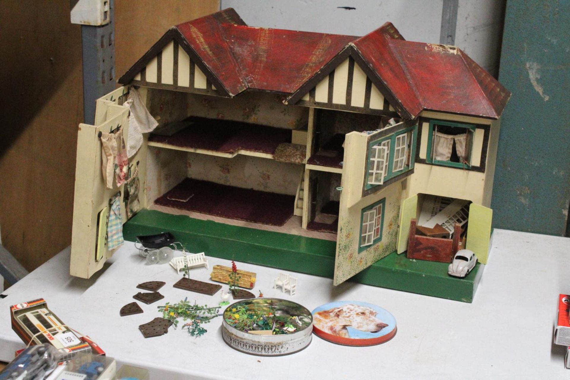 A VINTAGE DOLL'S HOUSE TO INCLUDE SOME ACCESSORIES PLUS A GARDEN ACCESSORIES, NEEDS MINOR