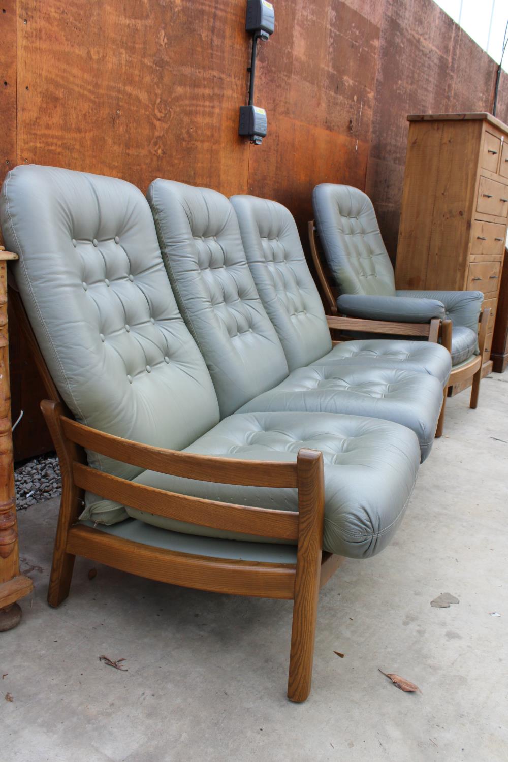 AN ERCOL THREE SEATER SETTEE AND FIRESIDE CHAIR - Image 3 of 3