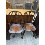 A PAIR OF ELM WHEEL-BACK WINDSOR CHAIRS WITH CRINOLINE BOWS