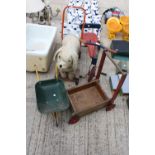 AN ASSORTMENT OF VINTAGE CHILDRENS TOYS TO INCLUDE A PUSH ALONG DOG AND A WHEEL BARROW ETC