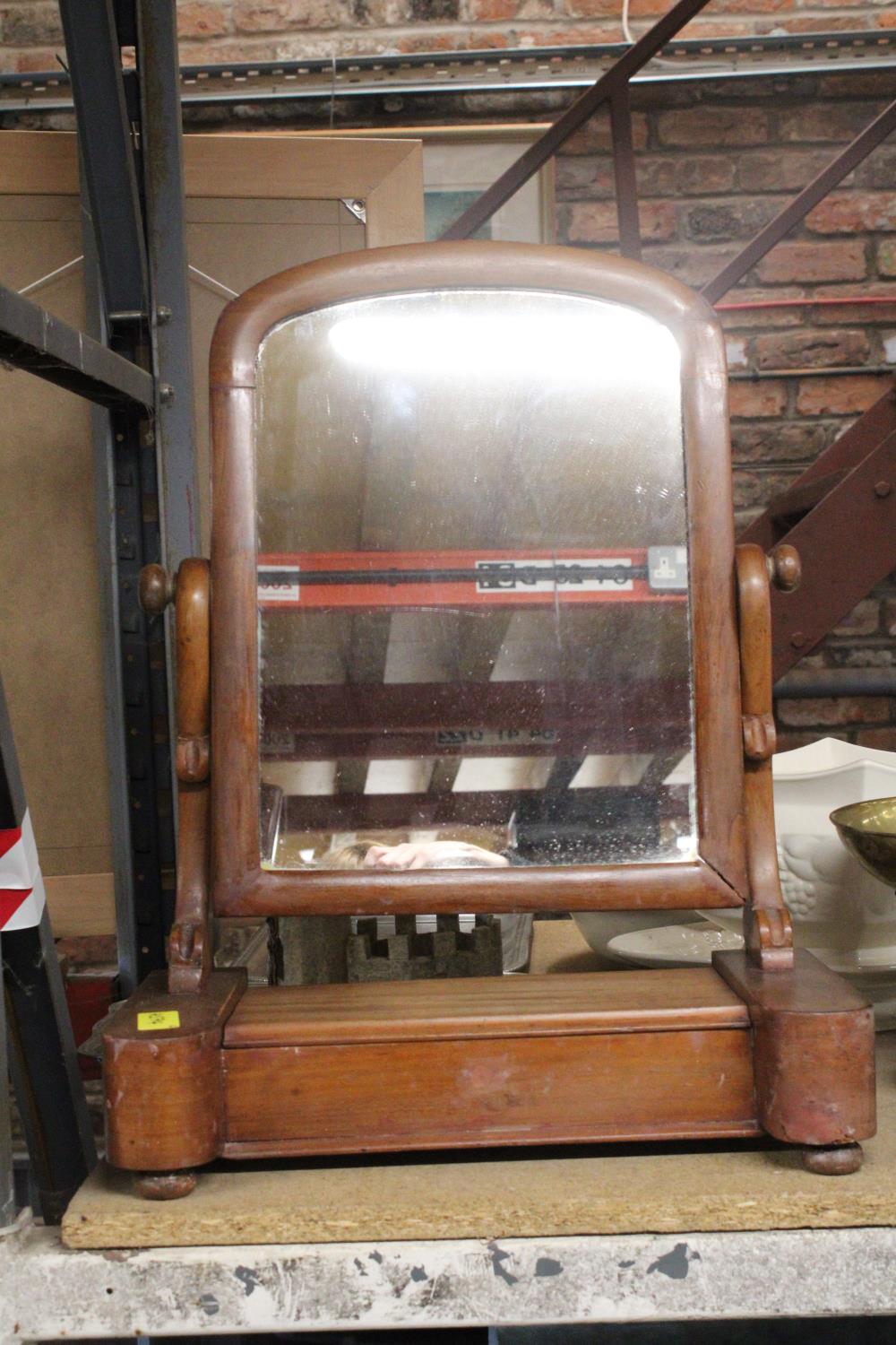 A TABLE TOP WOODEN SWING MIRROR WITH COMPARTMENT