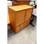 A RETRO TEAK NATHAN STYLE TV CABINET, 36" WIDE